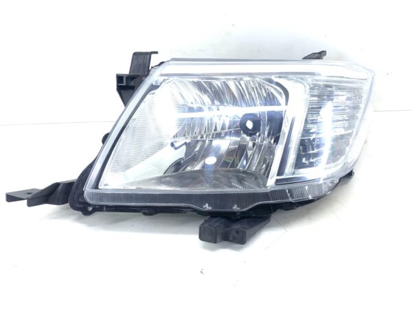 FAROL TOYOTA HILUX, 12/15, ESQUERDO.
